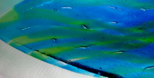 blue and green streaked fused glass