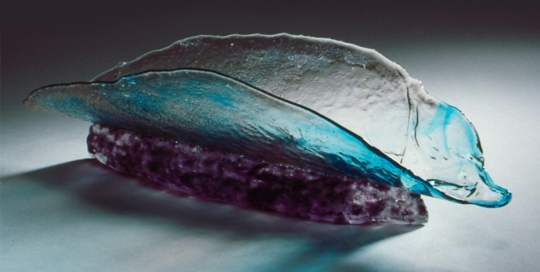 fused glass plate in blue and clear on purple base