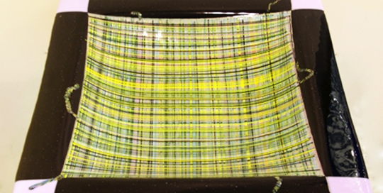 pink, black and yellow fused glass plate