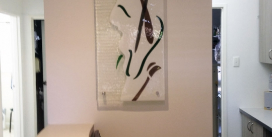 Abstract Glass wall art in commercial office