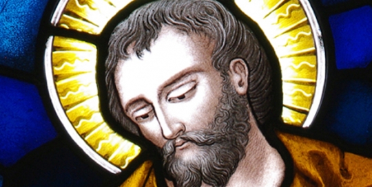 close up of saints face painted in stained glass