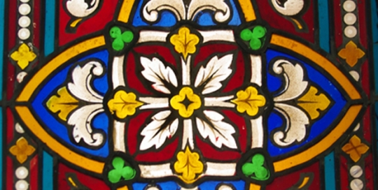 close up of stained glass window with pattern