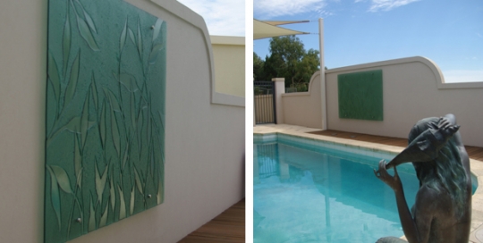 two photos up close and distant picture of outdoor pool glass leaves