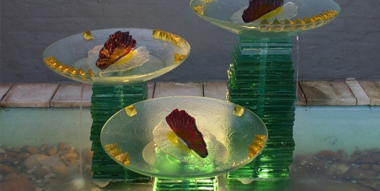 Water Feature glass sculptures of kiln formed bowls, amber pyramids and stacked glass plinths