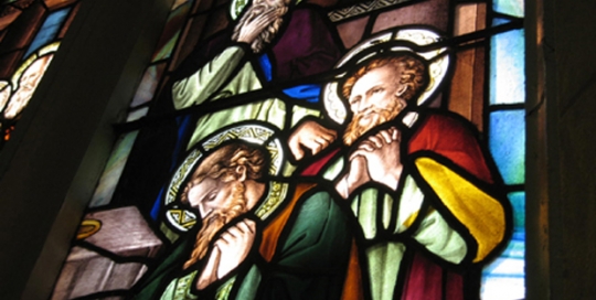 stained glass window of three saints