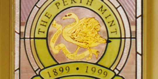 stained glass window the the perth mint logo