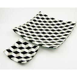 white and black geometric fused glass plates