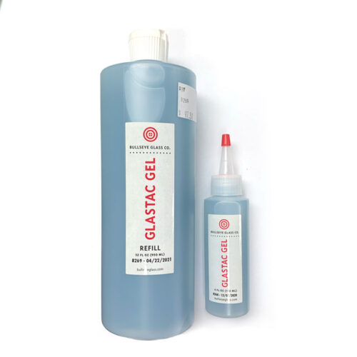 a large refill bottle and a small applicator bottle of blue liquid with label saying Gelastac Gel.