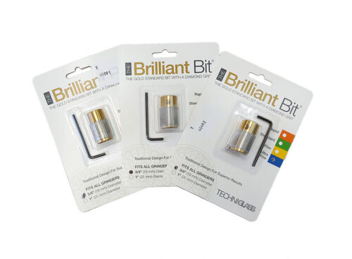 three packages of different brilliant grinder bit grits by techniglass fanned over each other