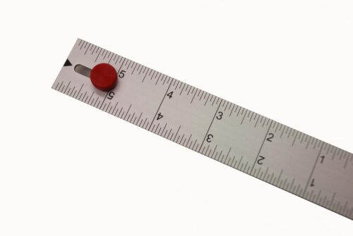 close up of beetle system ruler with red knob