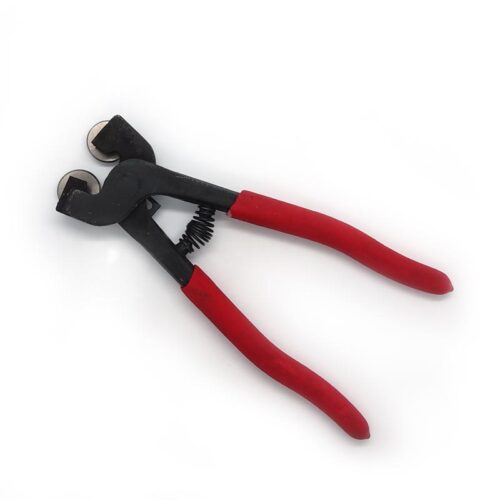 mosaic cutters with red handles with wheels face down