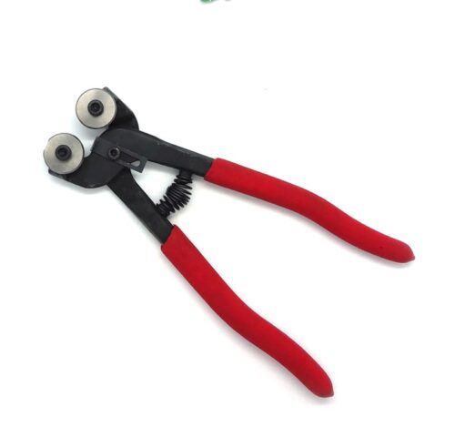 mosaic cutters with red handles with nipping wheels showing