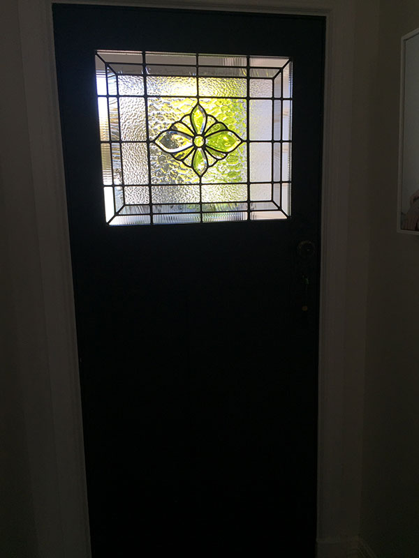 stained glass window made of clear textured glass and bevels