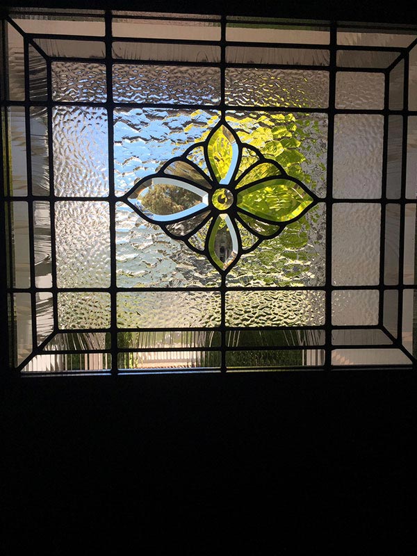 stained glass window made of clear textured glass and bevels