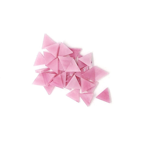 pile of pink and white triangle glass tiles