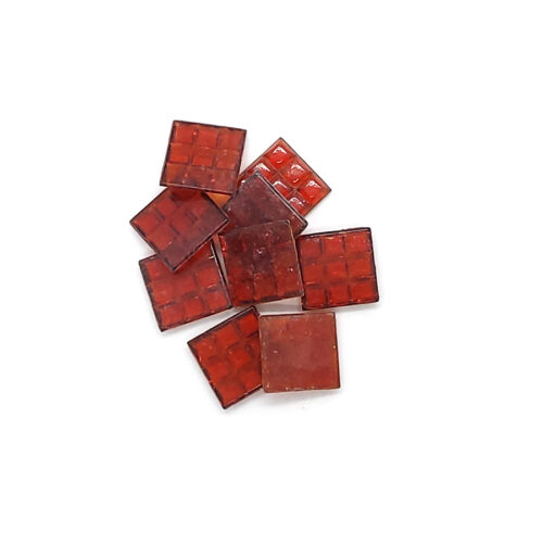 dark red transparent 20mm glass mosaic with flat finish tiles in pile on white background