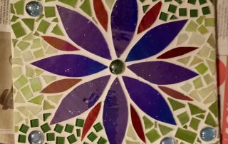completed glass mosaic of flower
