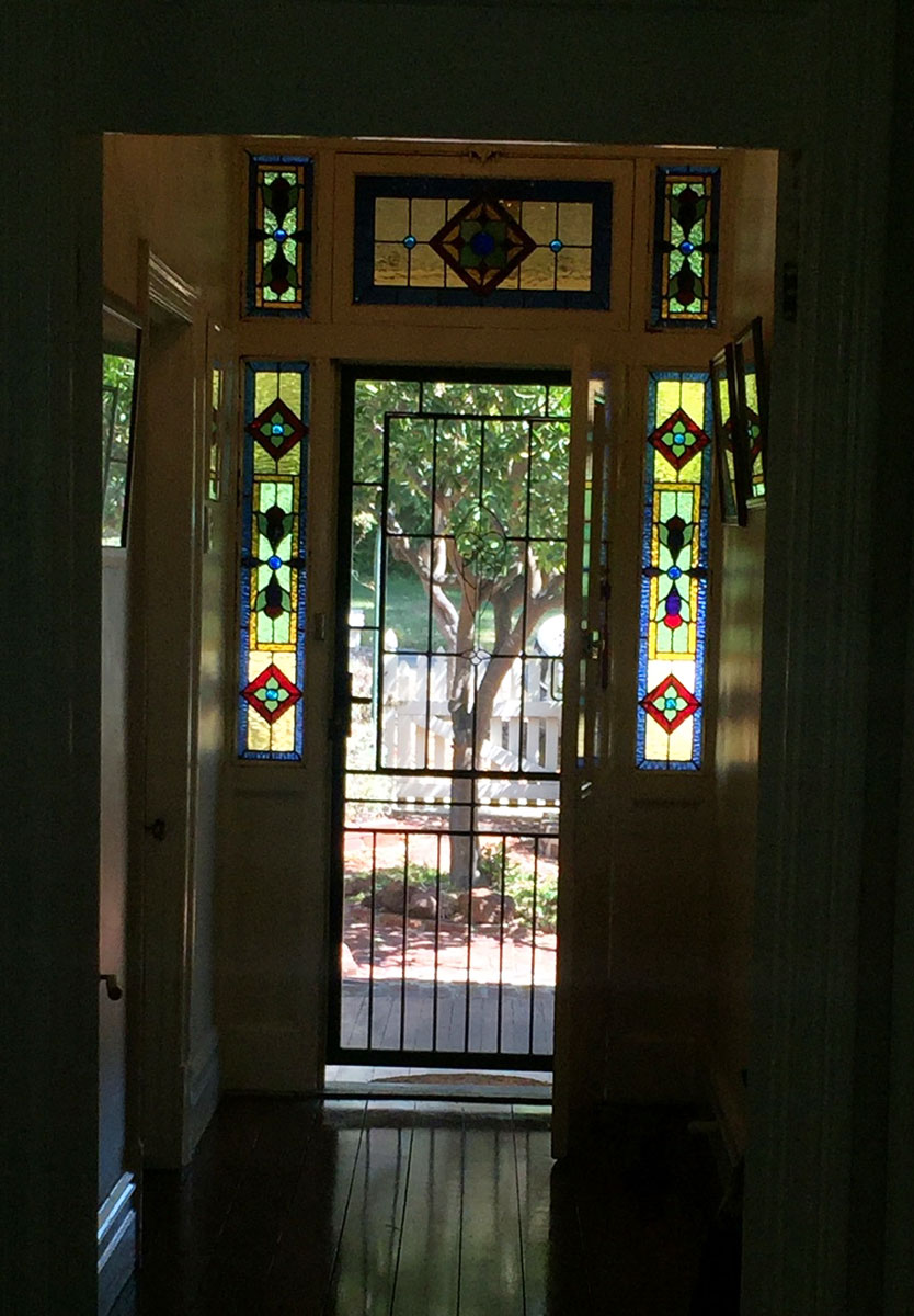 traditional leadlight entrance with five stained glass panels in door surrounds