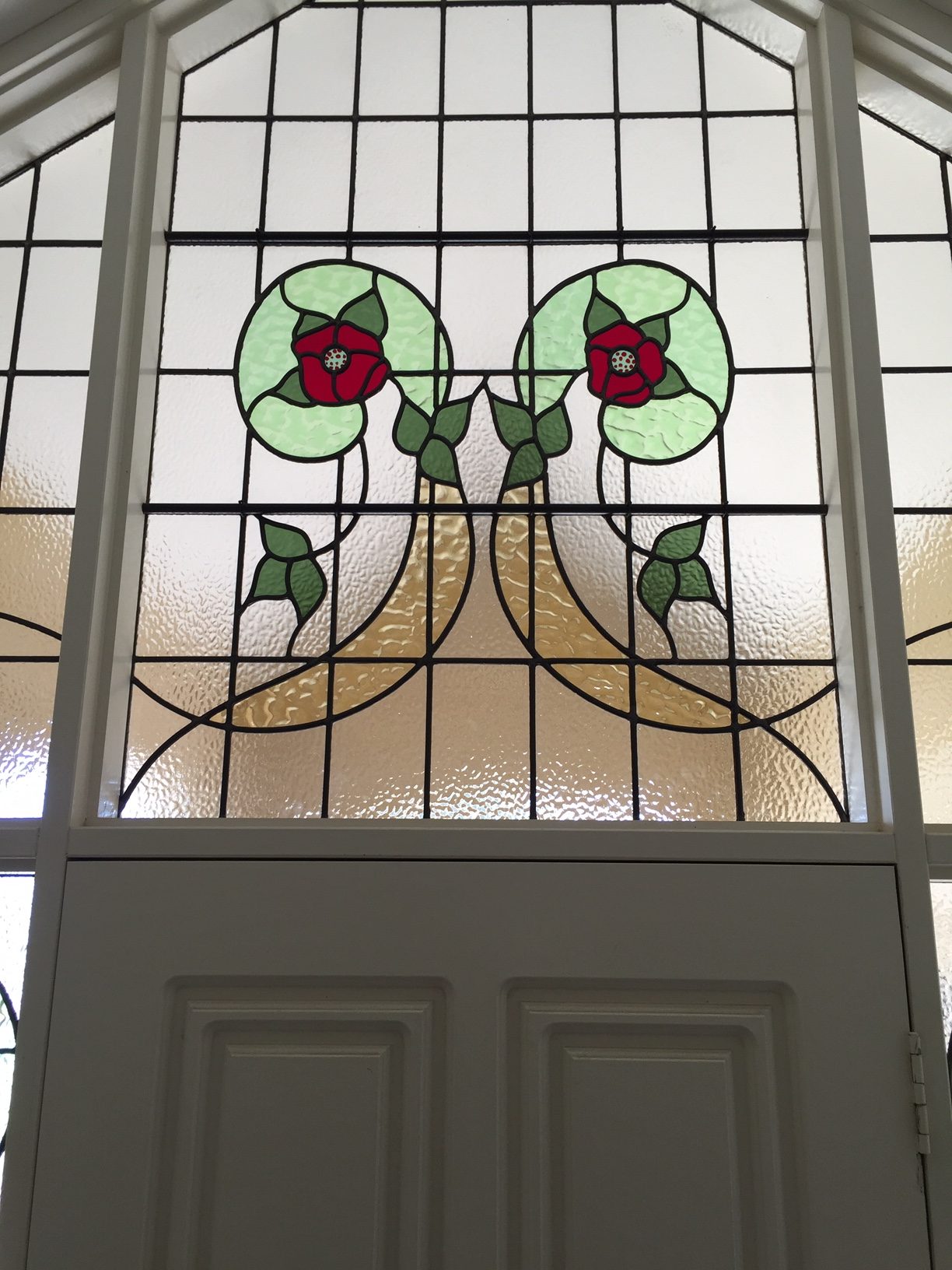 federation fanlight panel with rose stained glass design