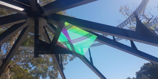 The wellness machine with dichroic glass panel
