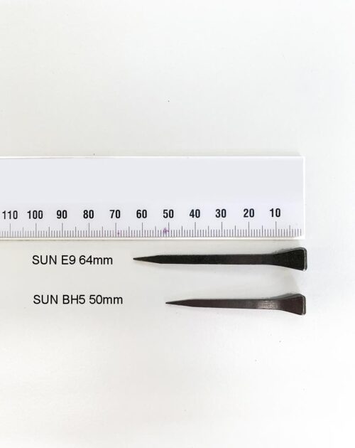 2 sizes of mustad horse shoe nails with a ruler showing big nail as 64mm and small as 50mm