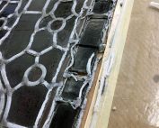 zoomed in on crumbled leadlight pre restoration