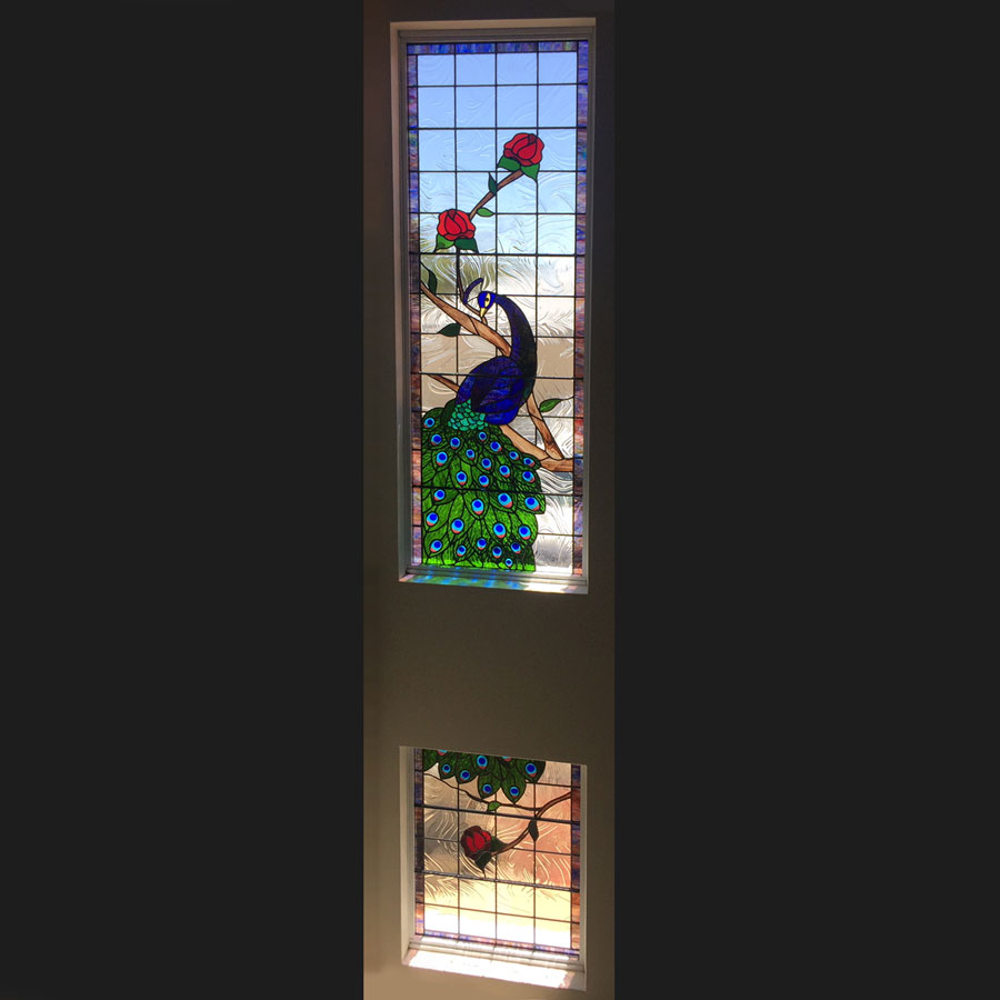 stained glass peacock stairwell window