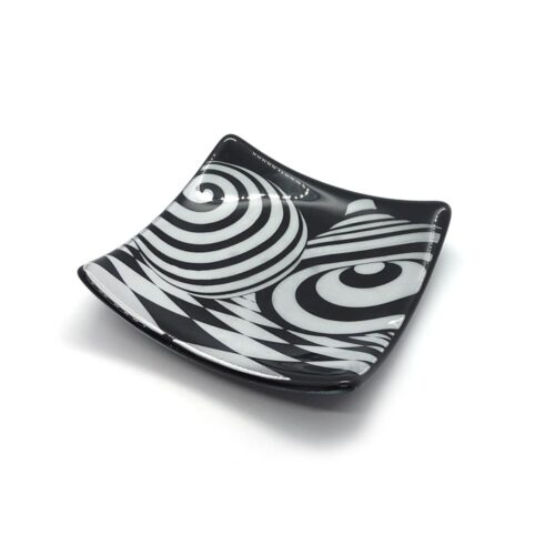 black and white geometric patterned glass plate swirls and cones
