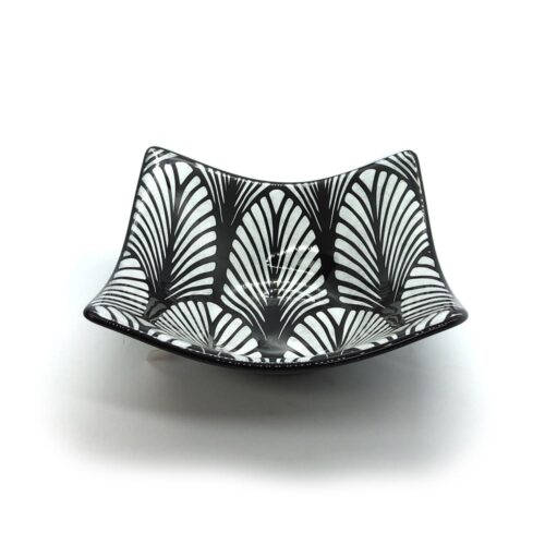 black and white geometric patterned glass plate leaves