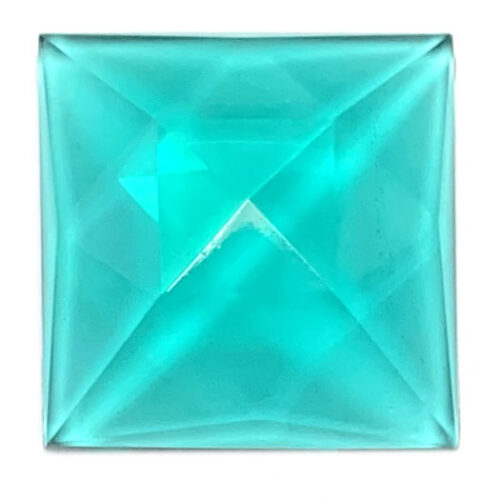 blue green cut glass jewel in the shape of a square