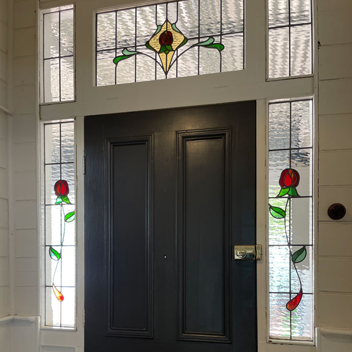 five window door surrounds with simple rose designs and clear texture