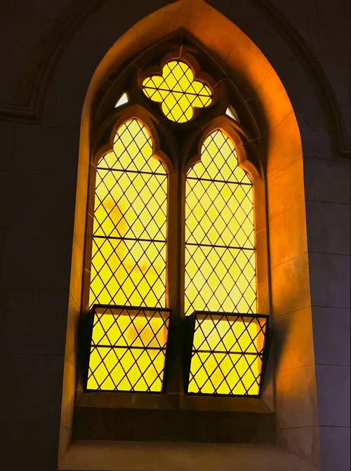 arched window with fixed glass leadlight