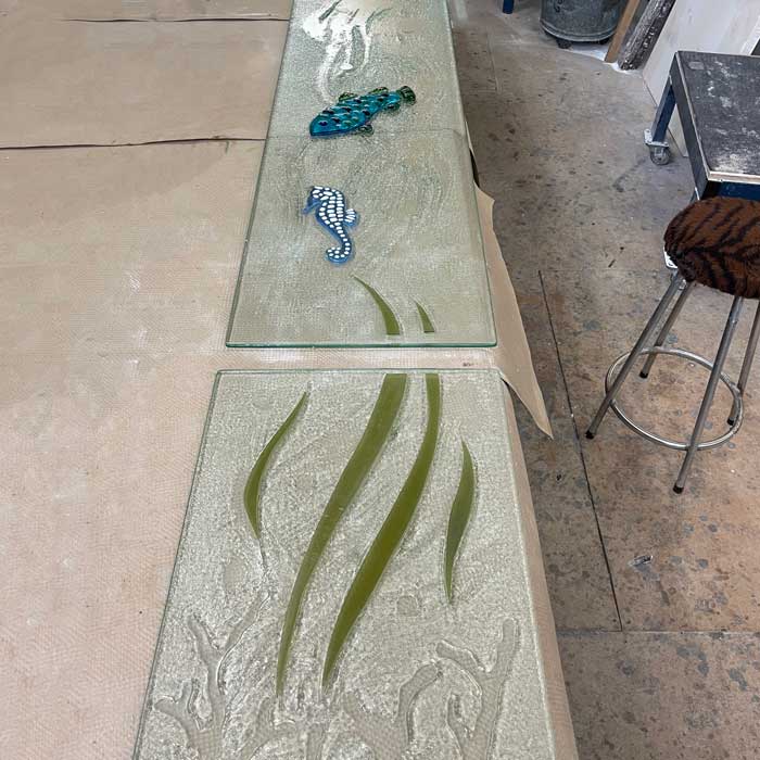 seahorse, fish and seaweed laminated to clear slumped glass panel