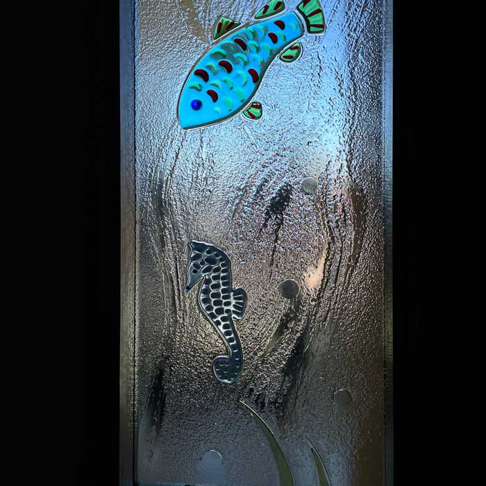 seahorse and fish in slumped laminated clear textured window