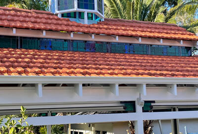 restored pergola with stained traditional glass windows