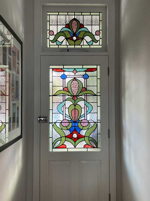 feature front door with colourful stained glass, traditional panels